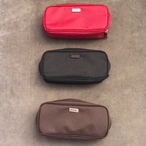 TUMI small Tavel cases in good condition $20 EACH